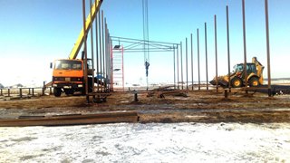 Аренда экскаватора погрузчика с ямобуром в Северск цена от 1548 руб